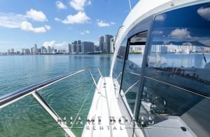 The left side of the 46' Beneteau yacht facing Downtown Miami.