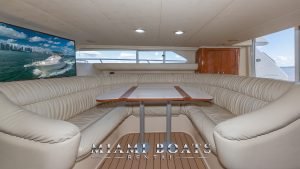 Leather couch and table in the main salon of the 50' Sea Ray yacht.