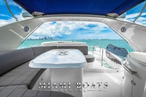 Flybridge of the 65' Azimut luxury yacht. Couch and table.