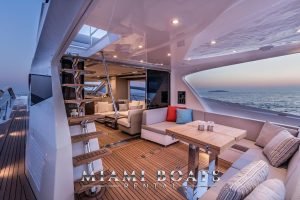 Aft deck of the 65' Numarine Luxury yacht at the sunset hour.