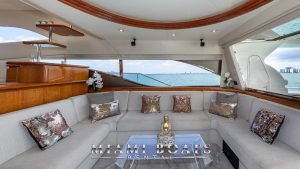 The rest area of the 70' Gianetti luxury yacht with Buddha statue on the table.