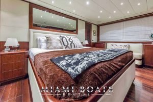Bedroom of the 92’ Mangusta Luxury Yacht.
