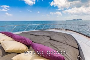 The bow of the 92' Mangusta Luxury Yacht facing the horizon.