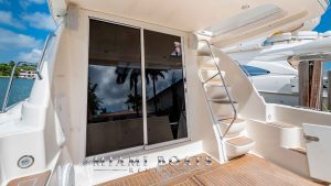 The image of the aft deck of the 41' Meridina Yacht. Beautiful yacht with modern exterior