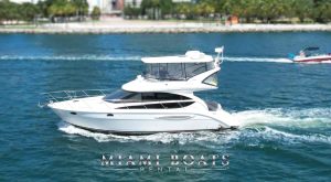 Meridian Yacht for Rental in Miami, sailing through Miami Brickell on Azure blue water. The Meridian Yacht 45ft Flybridge is the best choice for rental in Miami