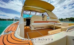 Aft deck of the boat Sea Ray Sundancer 44-ft. The Sea Ray Sundancer Harmony has wide-open aft deck area with the sittings and table and can accommodate on the boat up to 13 people