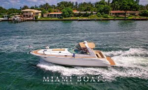 Boat rental in Miami on 45' Sea Ray Sundancer Yacht Harmony. Drifting in Miami Bay on the way to the Miami Islands. The boat on the water and waves are around the boat