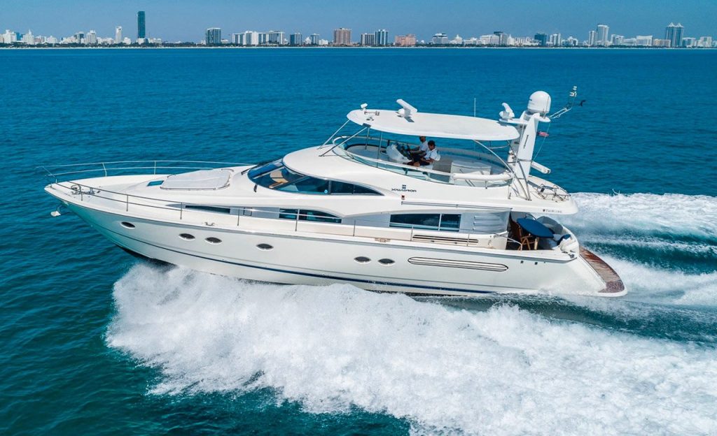 Luxury Yacht in Miami - 64 ft Fairline Maximus. White yacht overlooking the buildings. Yacht for Rental in Miami, FL.