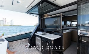 Slide-up tv - outdoor bar and lounge area on luxury yacht Galeon 65'