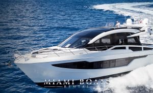 Yacht Charter in Miami with Galeon SKY 650. Luxury Yacht Galeon SKY 660 drifting on the water. The Galeon yacht is one of the Miami Boats Rental luxury fleets which located in Miami Beach.