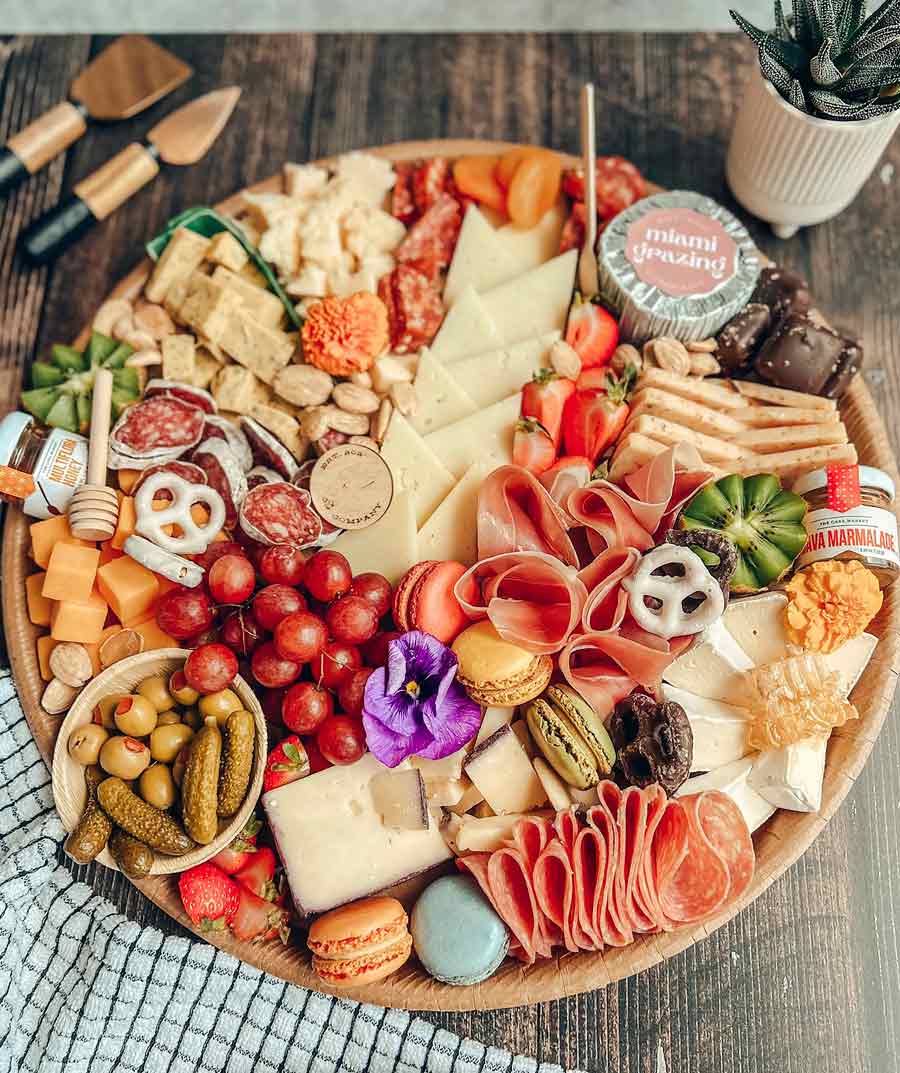 The cheese plate with meats for catering services of yacht rental in Miami