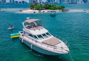 46' Sea Ray Yacht Flybridge in Miami Beach. Boat on the water and floating mat.