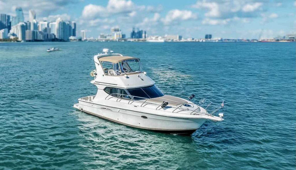 Miami Boats Rental - 41 foot Flybridge boat at Miami bay with beautiful Downtown Miami view, available for yacht charter