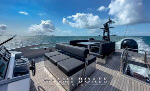 Elegant Outdoor Captain Sitting area on the flybridge of 92' Pershing Yacht Arena in Miami
