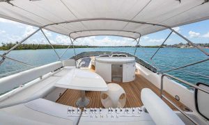 Flybridge deck of 74' Sunseeker yacht with white furniture