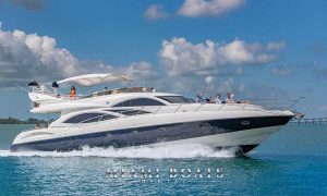 Luxury Yacht Sunseeker 74ft cruising on Miami Water.